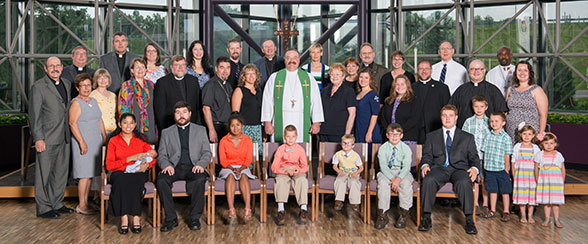 A group portrait of missionaries with LCMS Rev. Dr. Matthew C. Harrison (Center) during missionary orientation, June 2014.