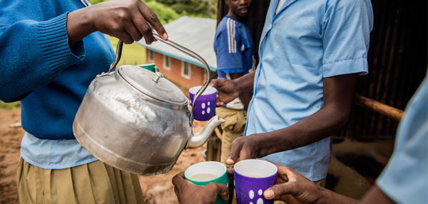 U-Dom ELCK (Evangelical Lutheran Church in Kenya) Project 24 students gather for tea following school on Wednesday, June 22, 2016, at the site in Chepareria, Kenya.