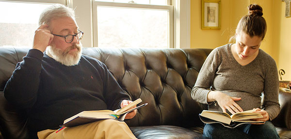 The Rev. David Kind, pastor of University Lutheran Chapel, prepares for afternoon prayer with Rebecca Wagner,  LCMS national missionary, at Luther House on Wednesday, Feb. 21, 2018, next to the University of Minnesota, Twin Cities, in Minneapolis. LCMS Communications/Erik M. Lunsford